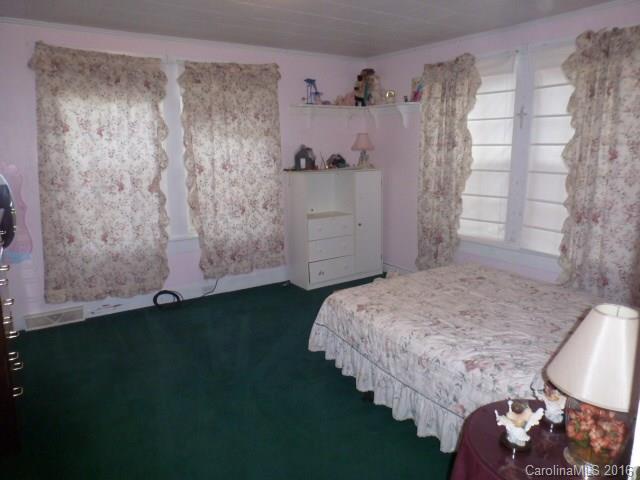 4852 Rowell Road Lancaster, SC 29720 - Photo 21 of 24 a bedroom with a bed and a window