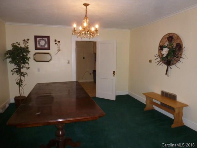 4852 Rowell Road Lancaster, SC 29720 - Photo 6 of 24 a view of a livingroom with furniture and chandelier