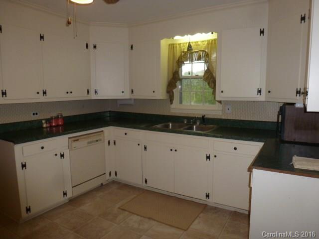 4852 Rowell Road Lancaster, SC 29720 - Photo 8 of 24 a view of a kitchen with window