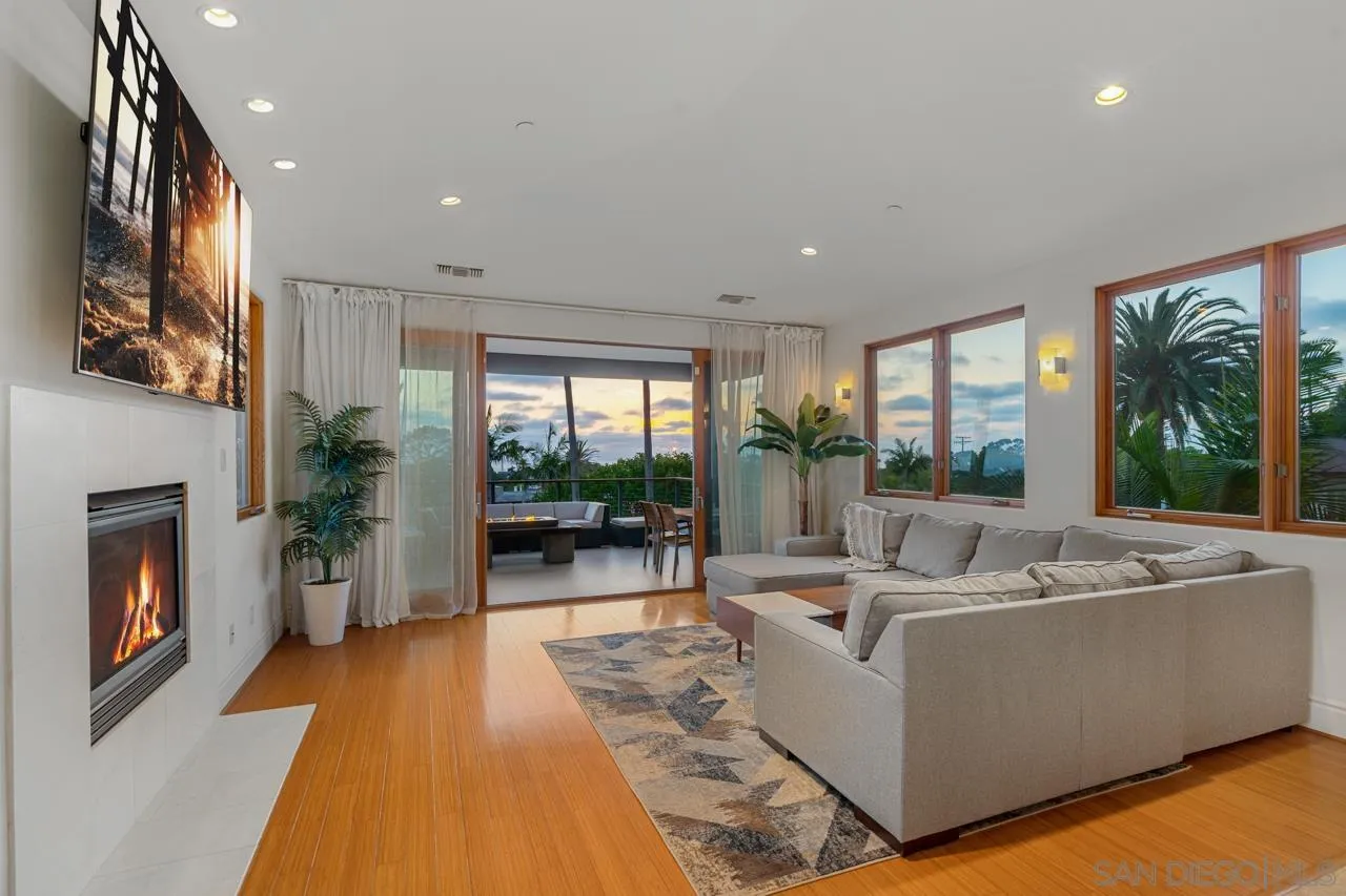 733 Stratford Drive Encinitas, CA 92024 - Photo 19 of 46 a living room with furniture and a fireplace