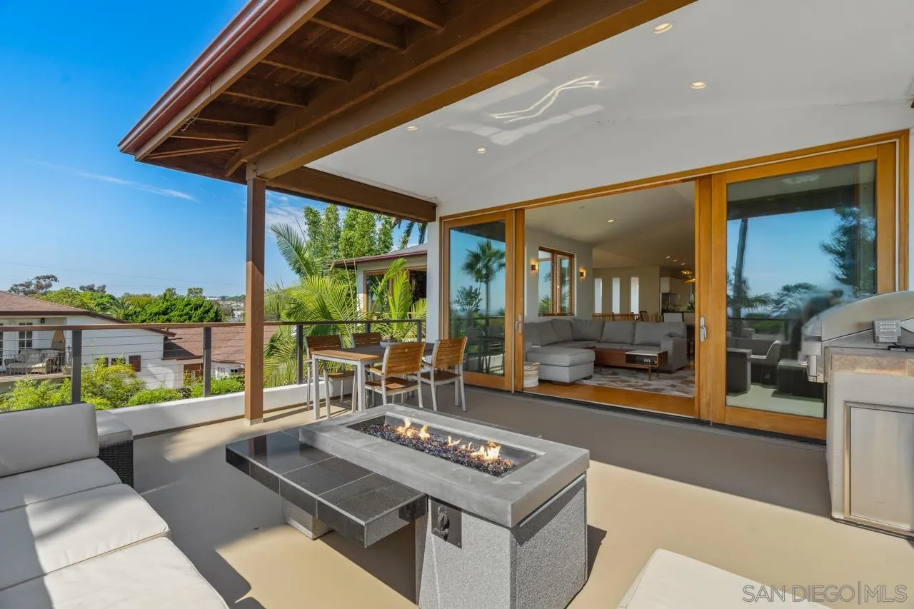 733 Stratford Drive Encinitas, CA 92024 - Photo 23 of 46 a living room with furniture and a large window