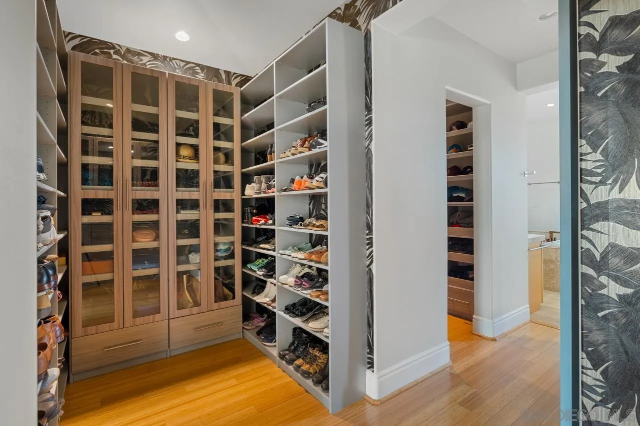 733 Stratford Drive Encinitas, CA 92024 - Photo 28 of 46 a view of an empty room with wooden floor and windows