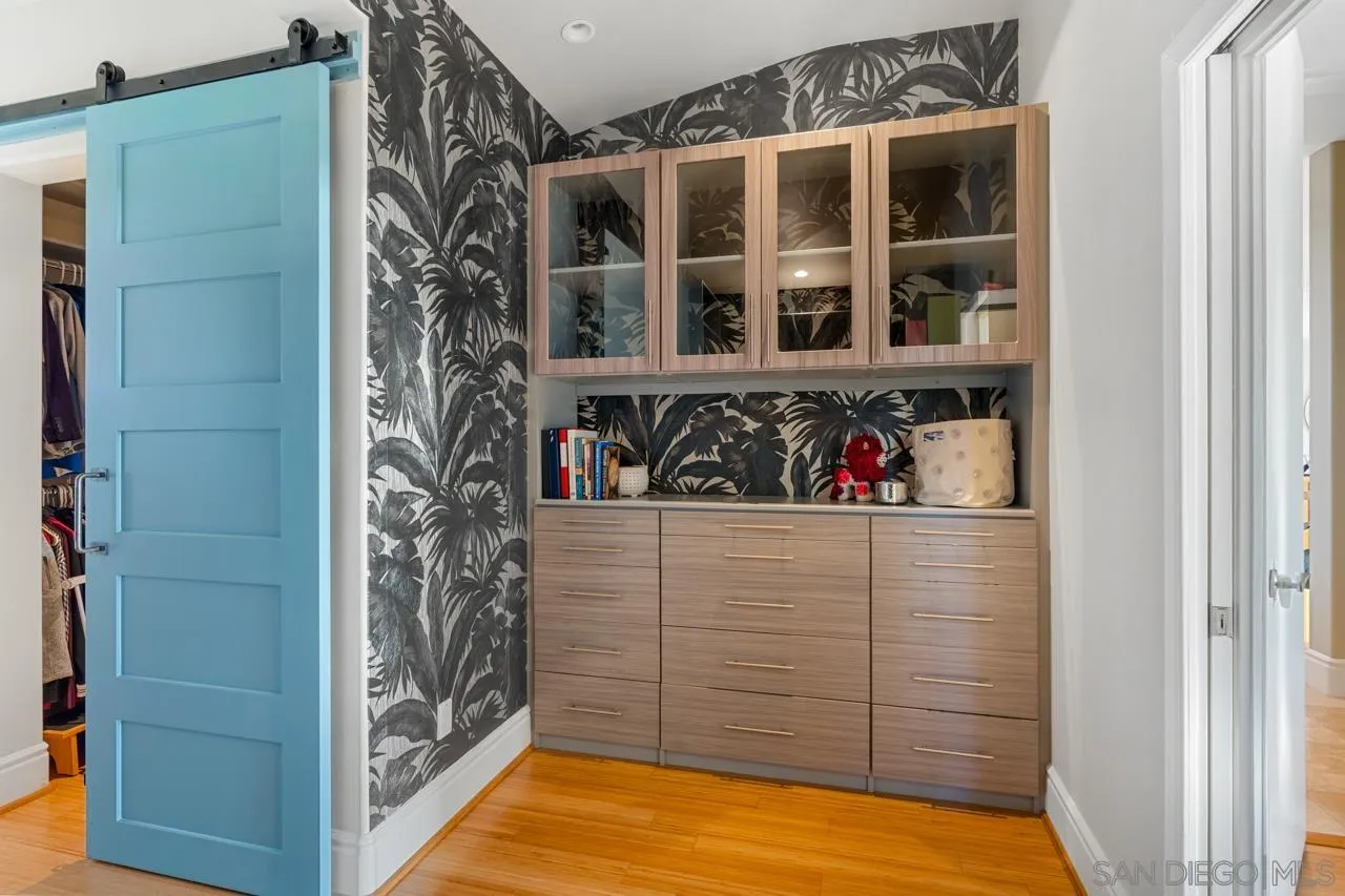 733 Stratford Drive Encinitas, CA 92024 - Photo 29 of 46 a view of walk in closet with clothes