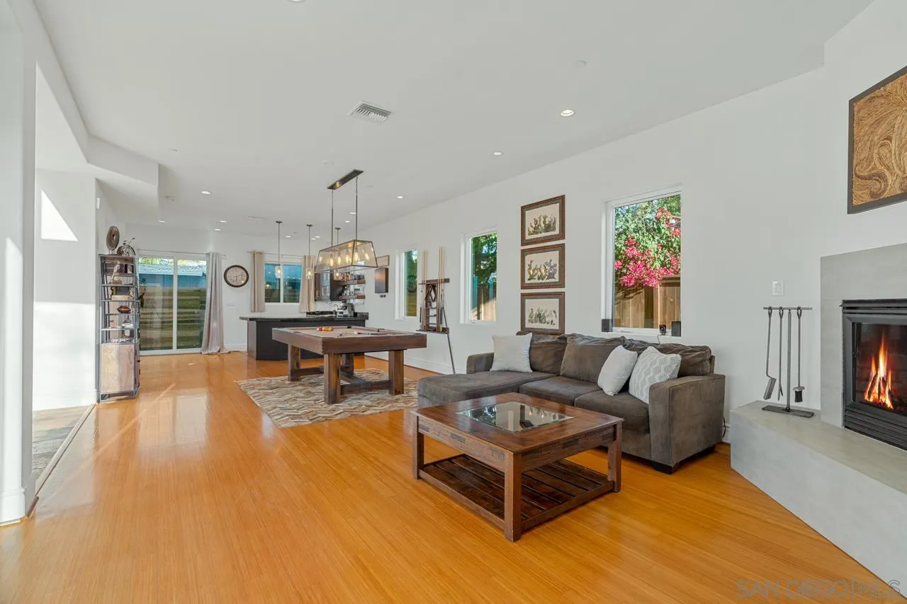 733 Stratford Drive Encinitas, CA 92024 - Photo 33 of 46 a living room with furniture and a fireplace