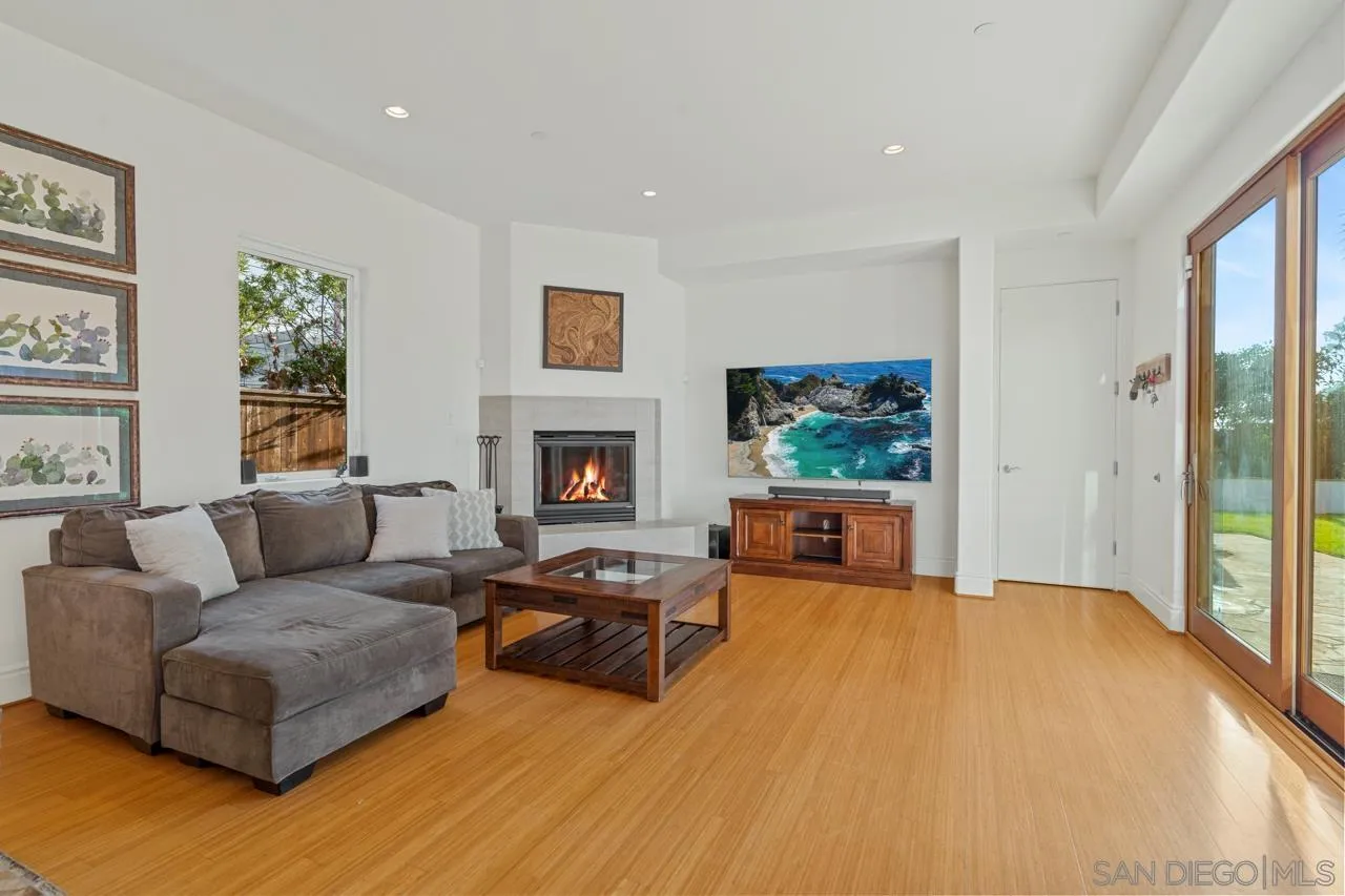 733 Stratford Drive Encinitas, CA 92024 - Photo 34 of 46 a living room with furniture and a fireplace