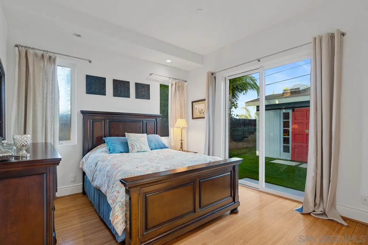 733 Stratford Drive Encinitas, CA 92024 - Photo 36 of 46 a bed sitting in a bedroom next to a window