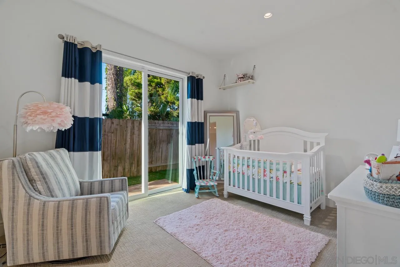 733 Stratford Drive Encinitas, CA 92024 - Photo 37 of 46 a bedroom with furniture and a large window