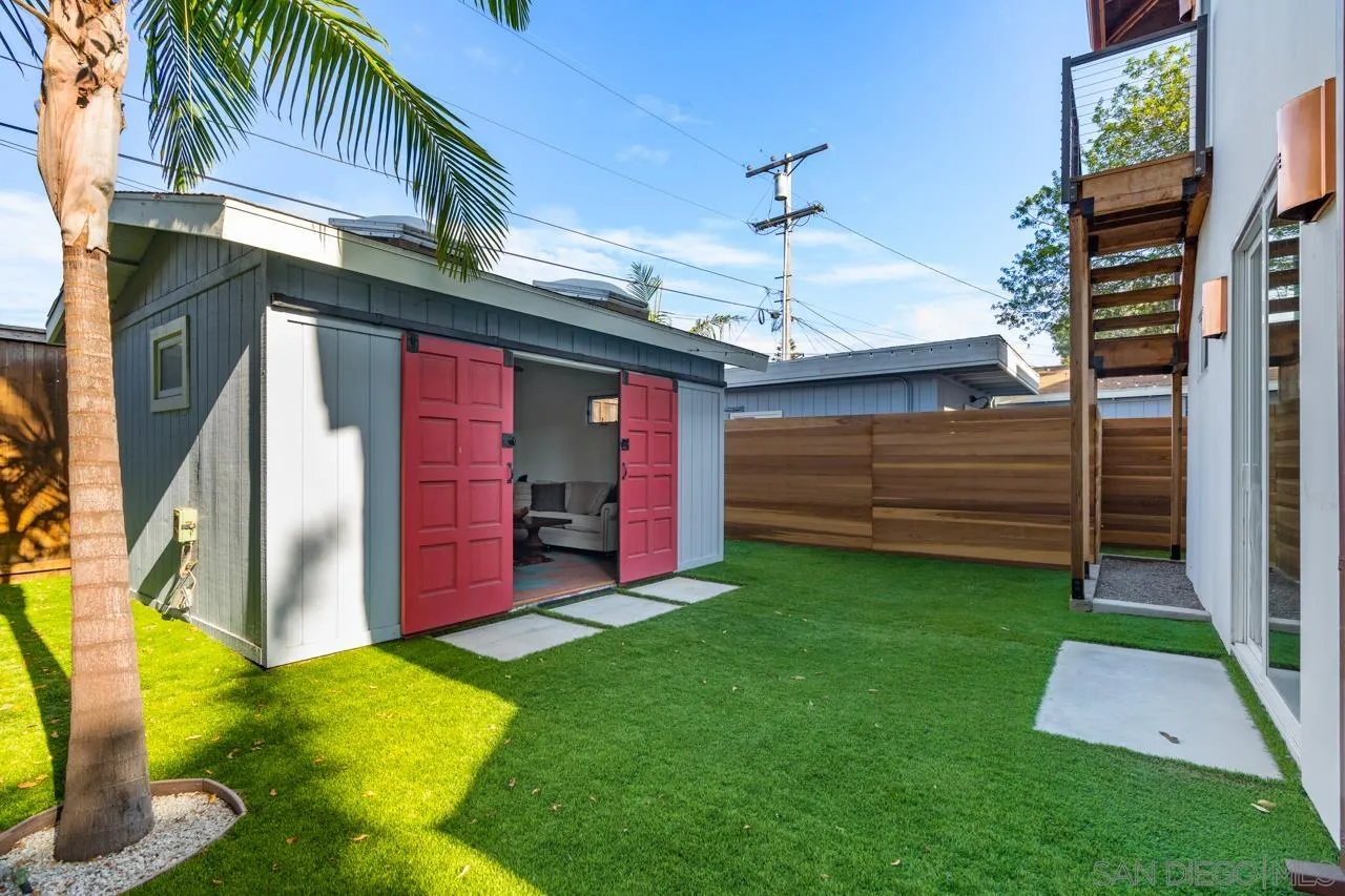 733 Stratford Drive Encinitas, CA 92024 - Photo 39 of 46 a view of a backyard with a small cabin