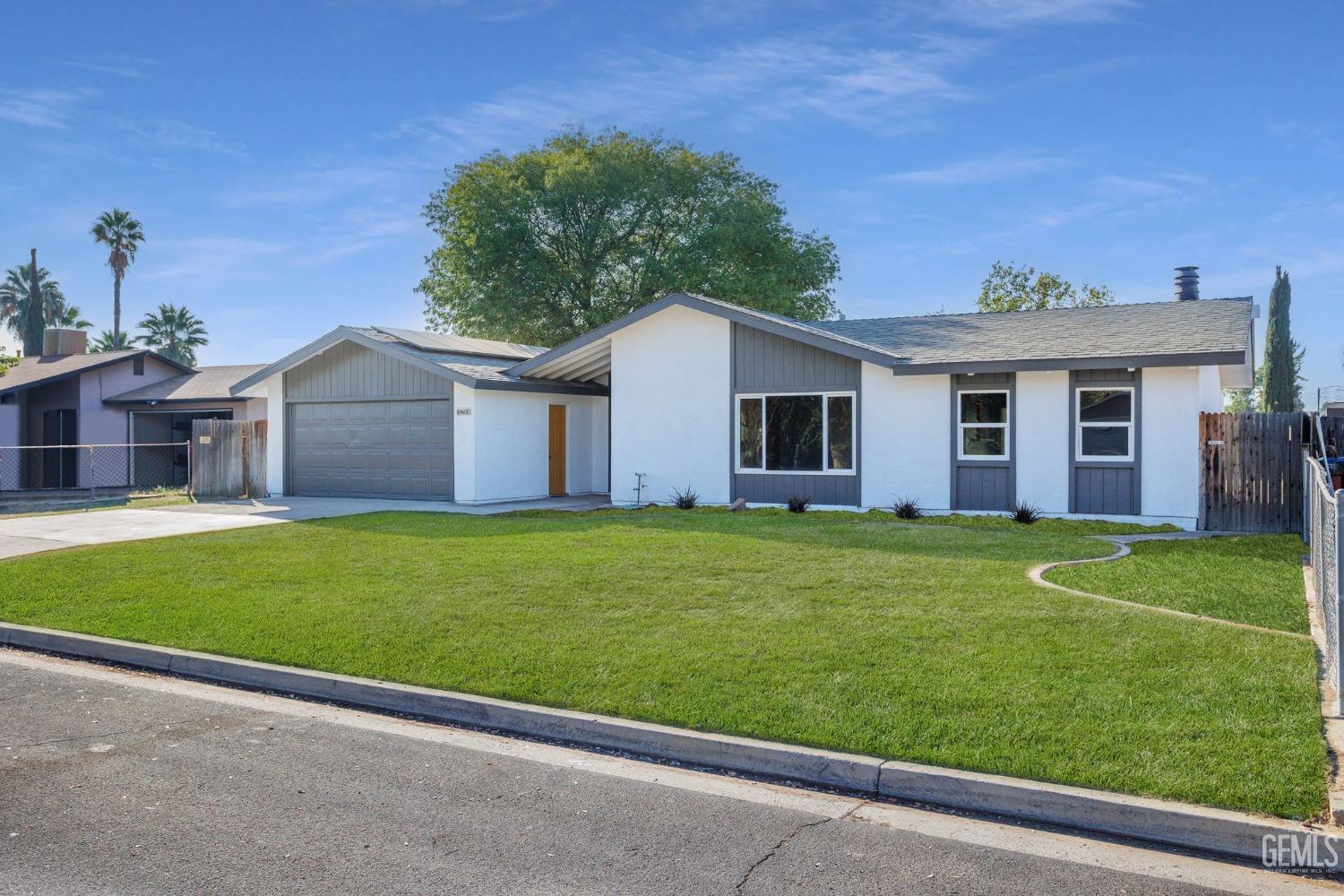 Undisclosed Address Bakersfield, CA 93312 - Photo 2 of 29 a view of a house with a backyard