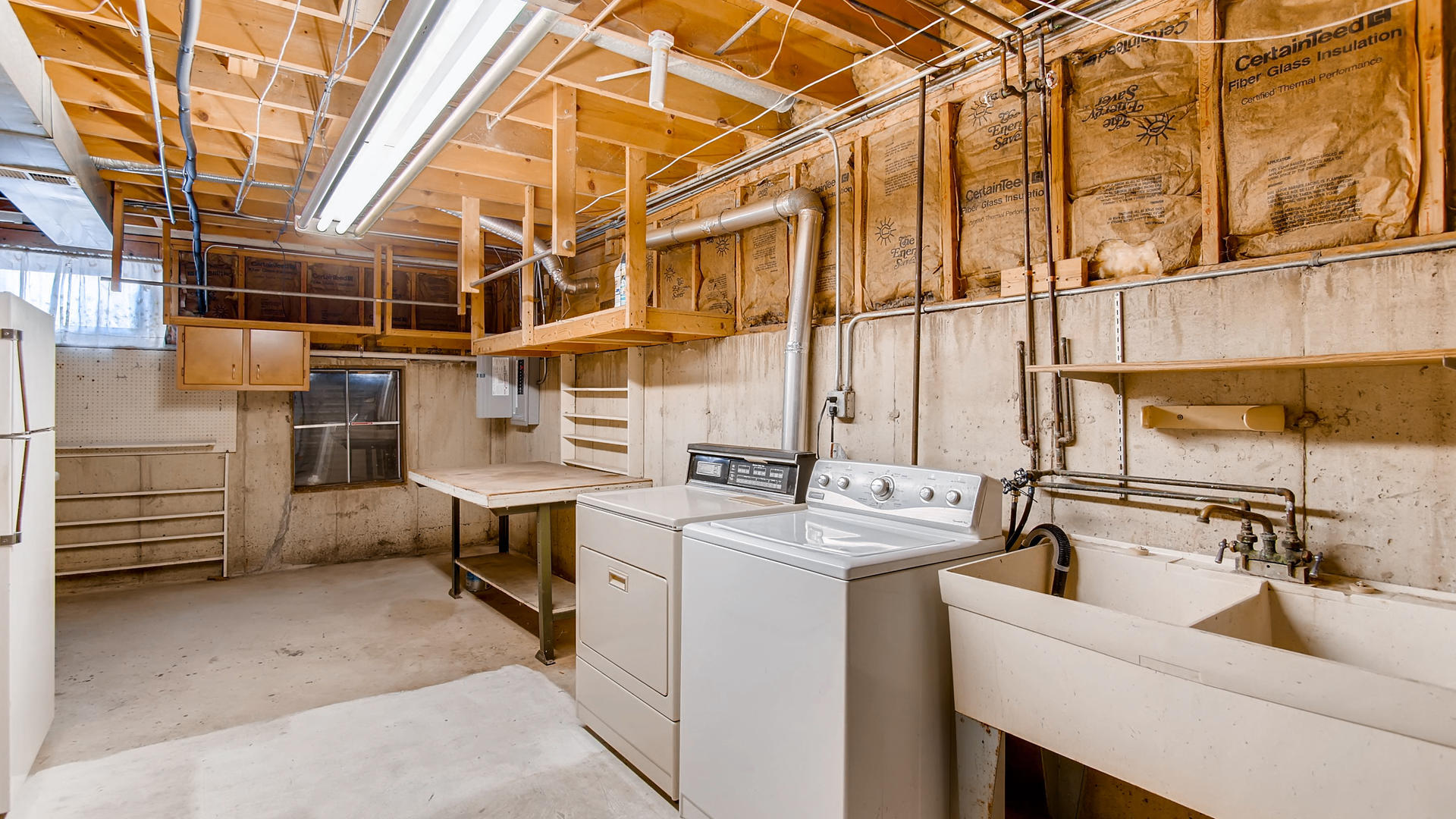 1229 Honey Hill Road Addison, IL 60101 - Photo 19 of 25 a utility room with dryer and washer