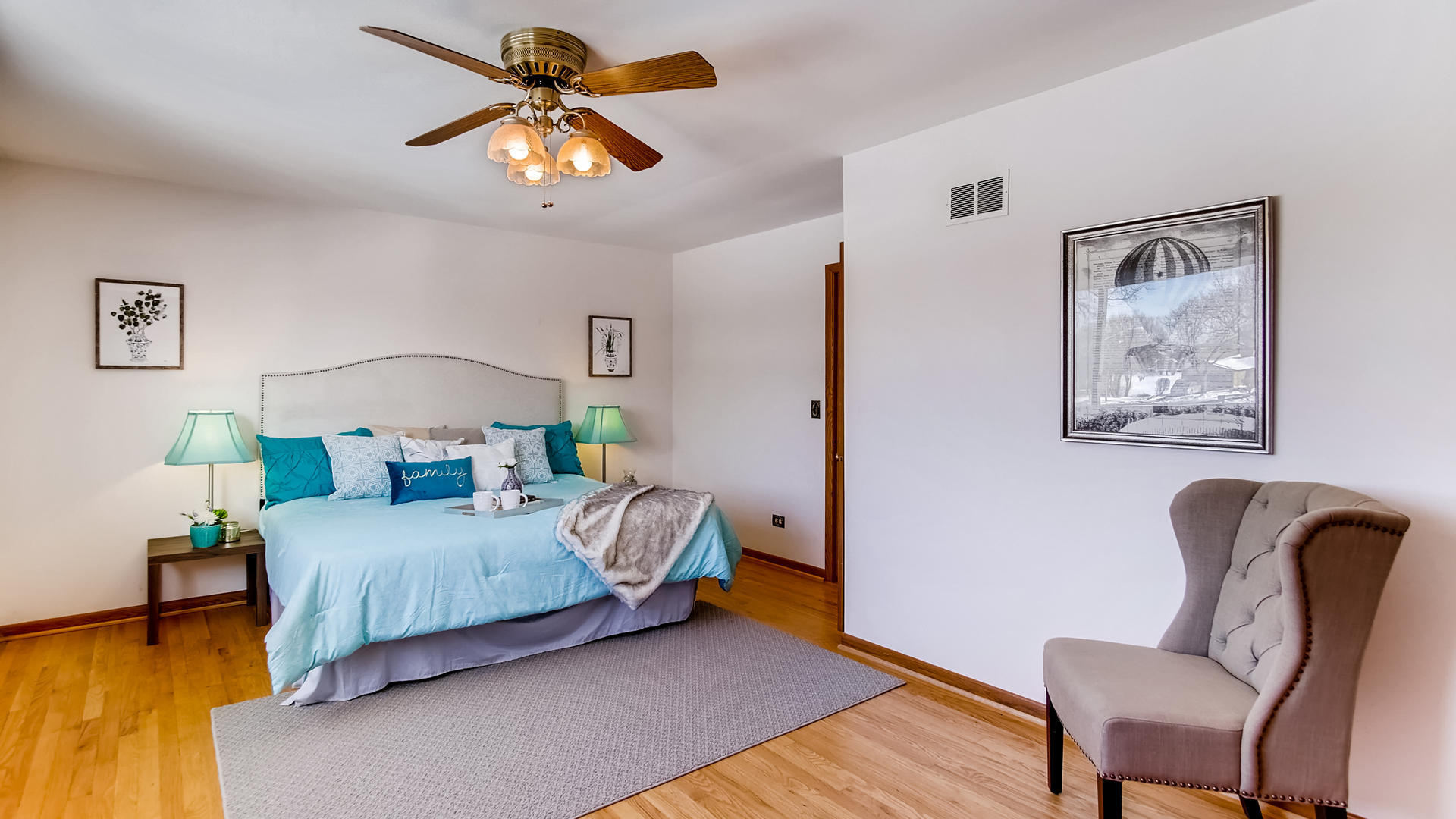 1229 Honey Hill Road Addison, IL 60101 - Photo 9 of 25 a bedroom with a bed furniture and a chandelier
