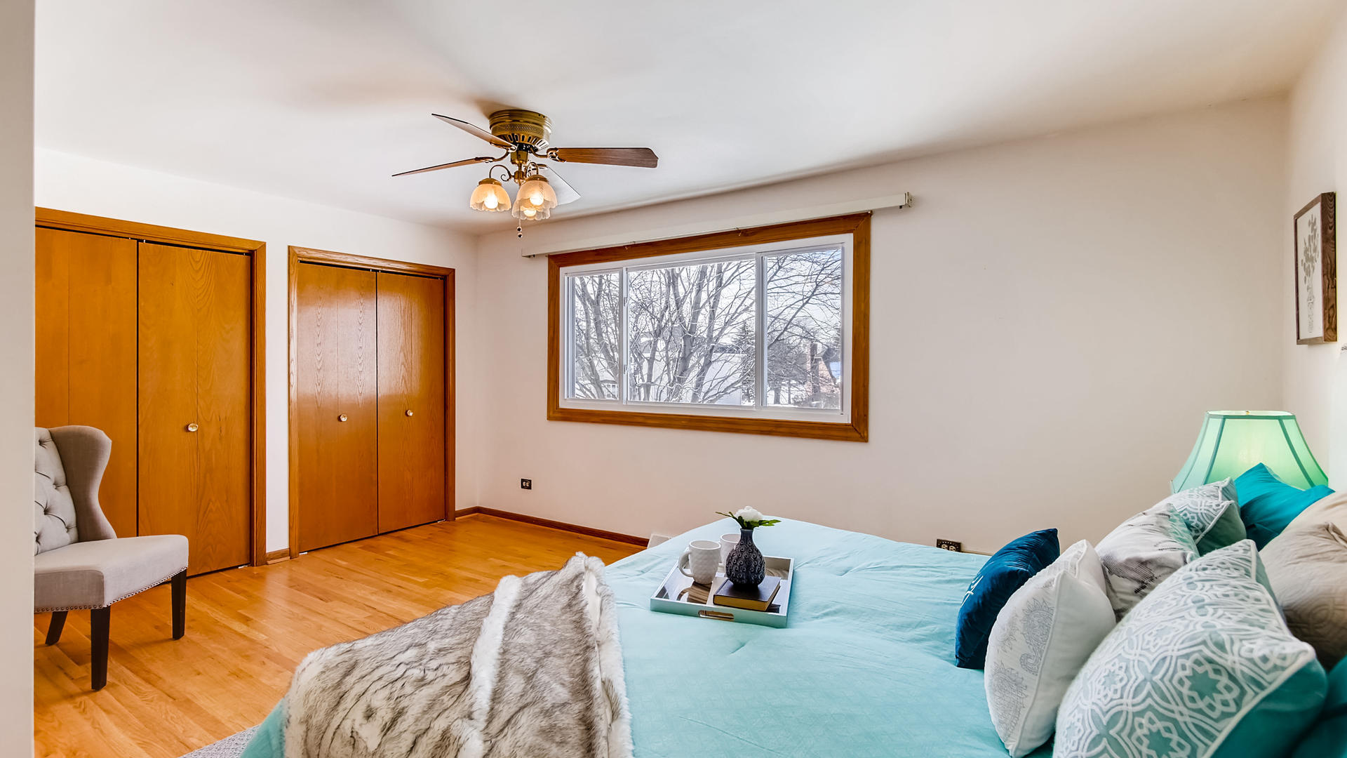 1229 Honey Hill Road Addison, IL 60101 - Photo 10 of 25 a bedroom with bed and a window