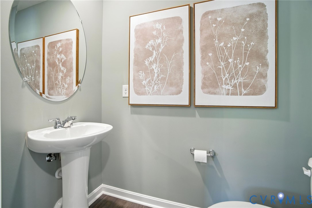 3505 Perrins Hill Way Prince George, VA 23875 - Photo 11 of 24 a bathroom with a sink mirror and toilet