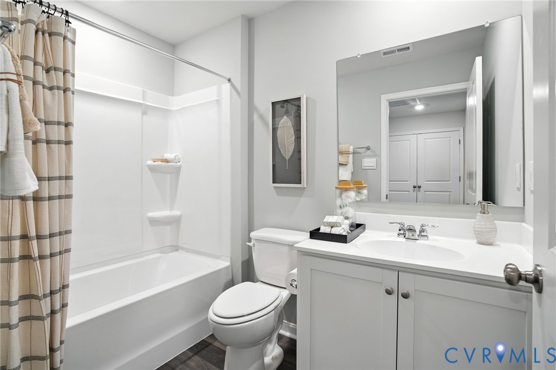 3505 Perrins Hill Way Prince George, VA 23875 - Photo 15 of 24 a bathroom with a sink toilet and shower