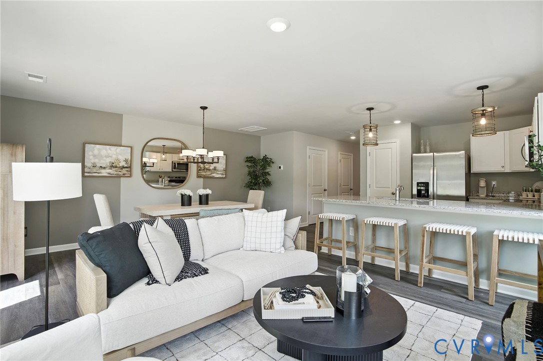 3505 Perrins Hill Way Prince George, VA 23875 - Photo 6 of 24 a living room with furniture and a wooden floor