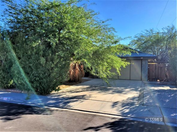 548 South Fairview Street Ridgecrest, CA 93555 - Photo 32 of 35 a view of a house with yard and tree s