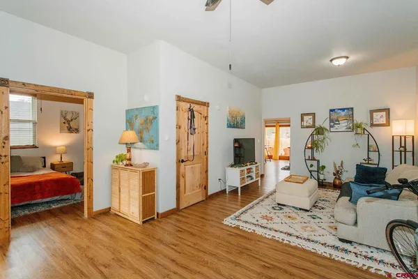 a room with furniture and a wooden floor