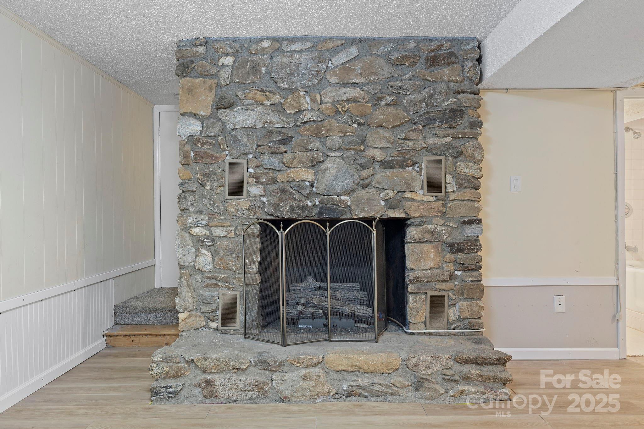 95 Temple Road Black Mountain, NC 28711 - Photo 20 of 30 a close view of a fireplace in a room