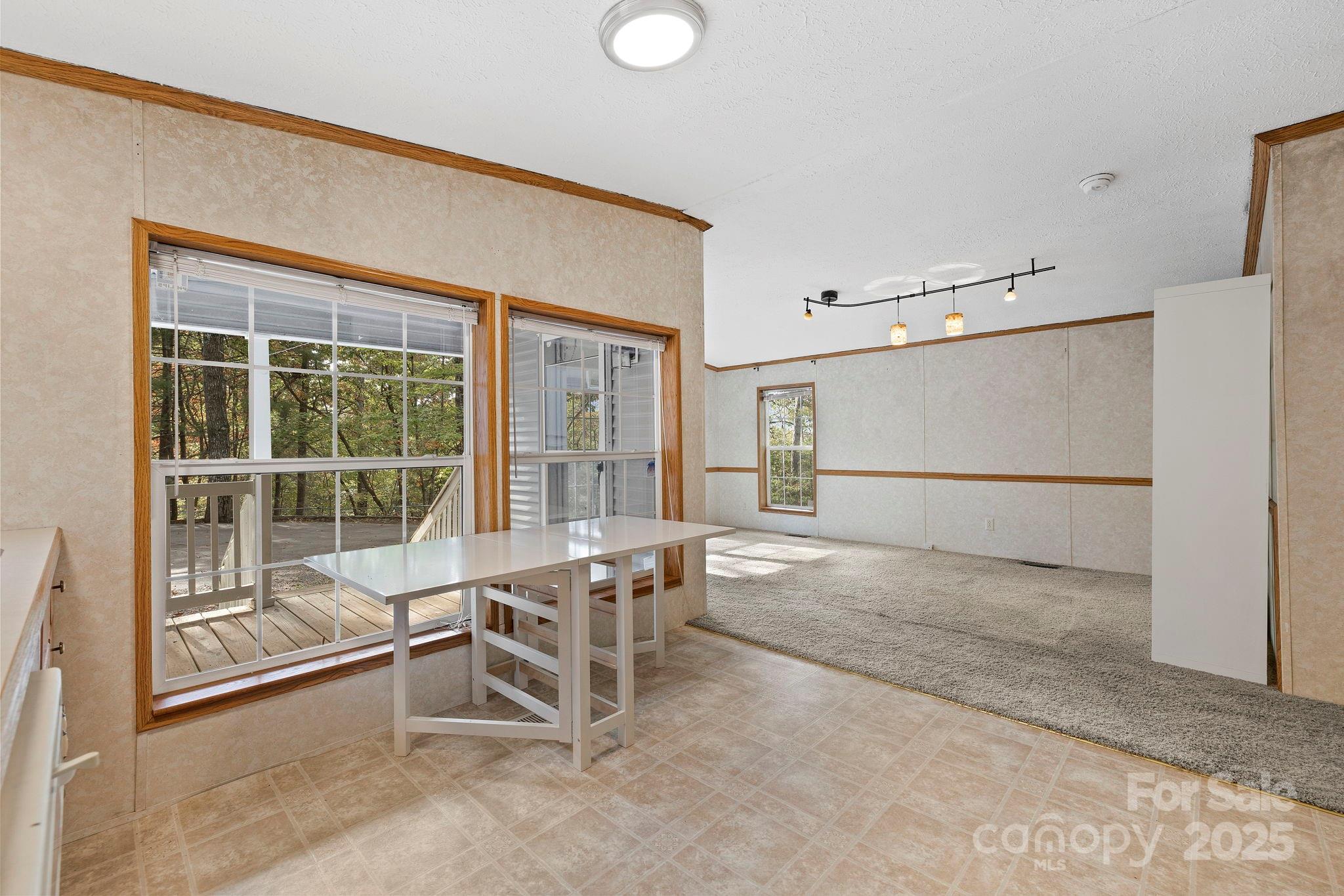 95 Temple Road Black Mountain, NC 28711 - Photo 25 of 30 a view of an empty room with a window