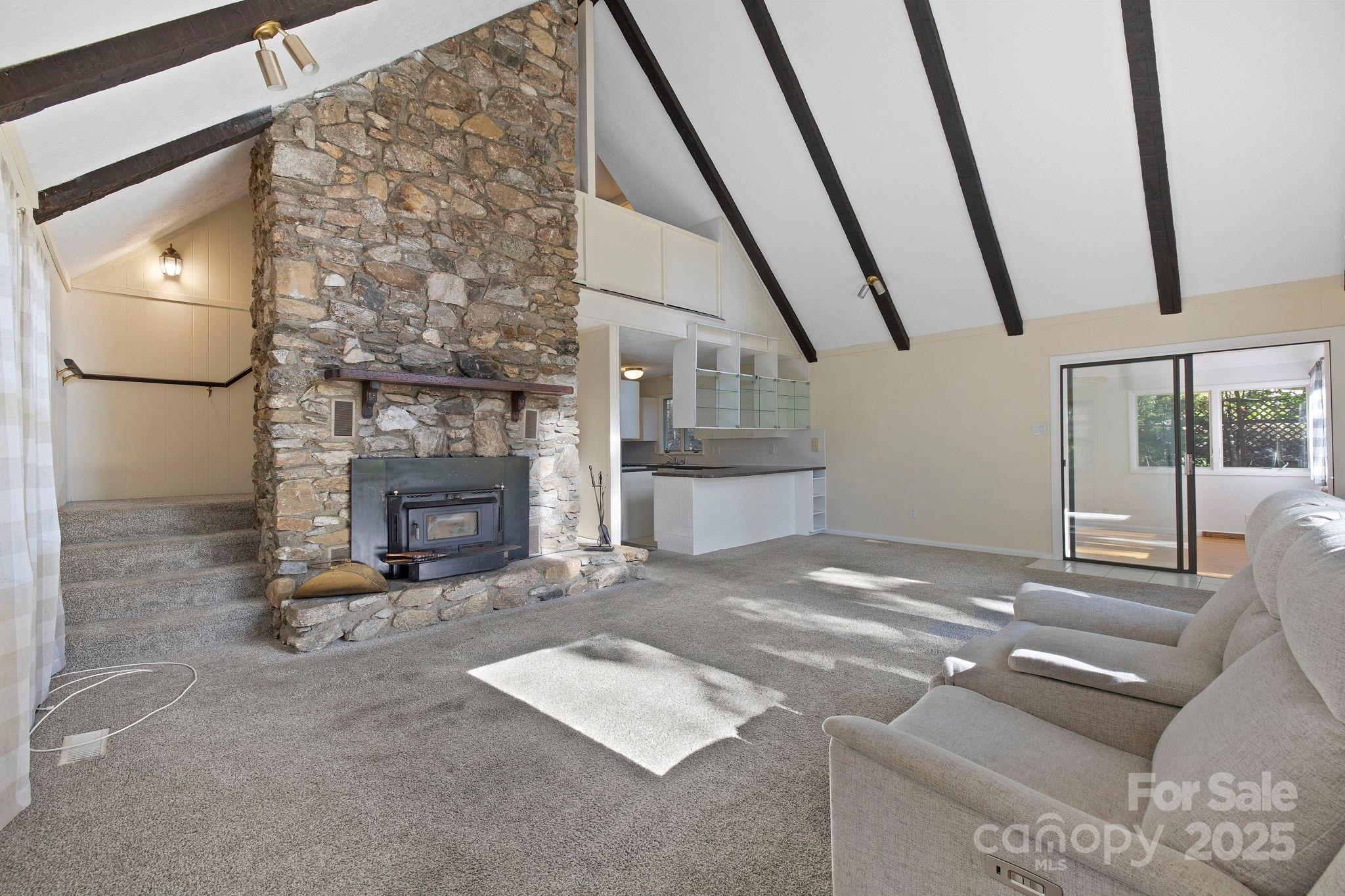 95 Temple Road Black Mountain, NC 28711 - Photo 5 of 30 a living room with furniture and a fireplace
