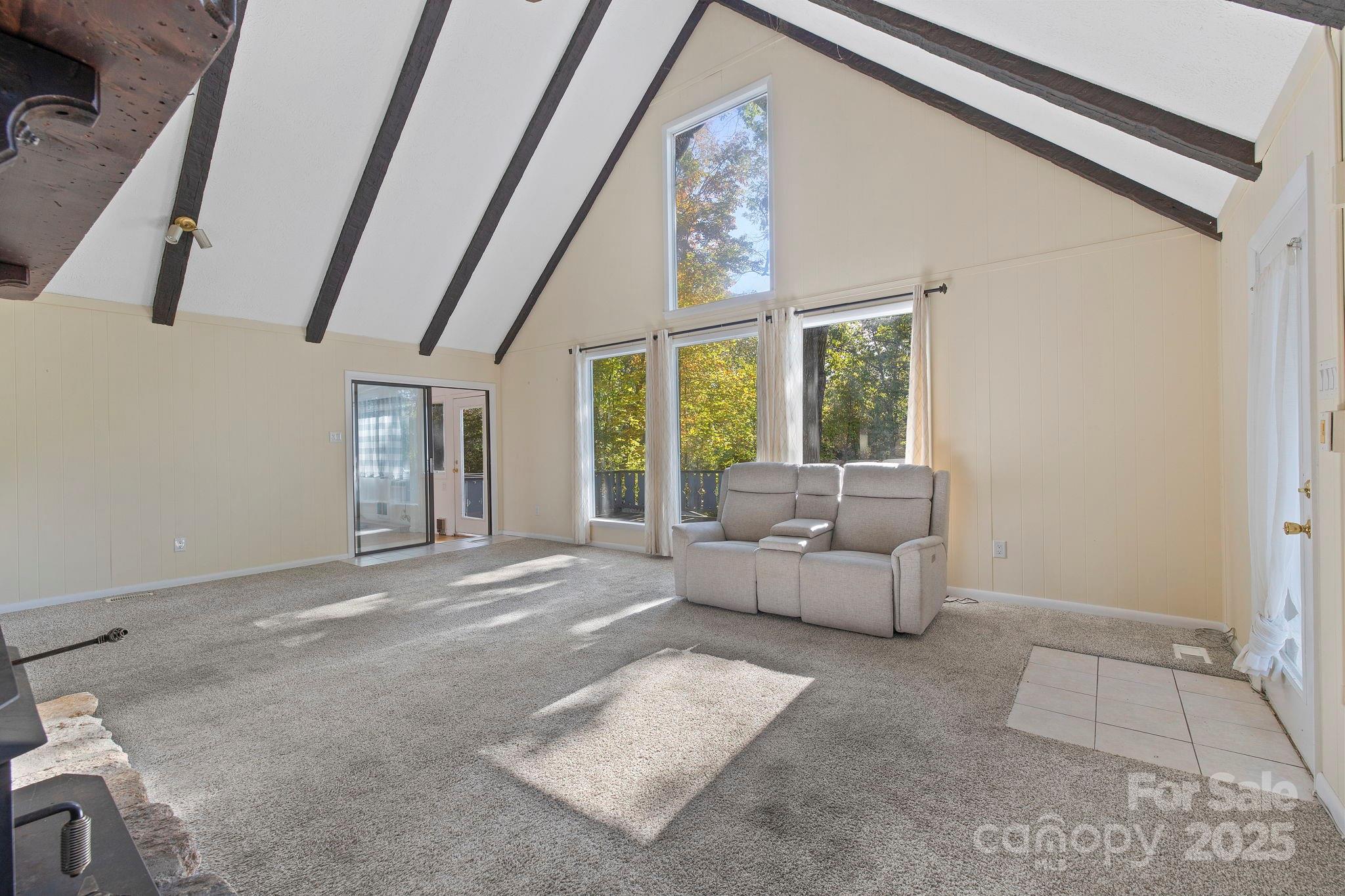 95 Temple Road Black Mountain, NC 28711 - Photo 6 of 30 a living room with furniture and a large window