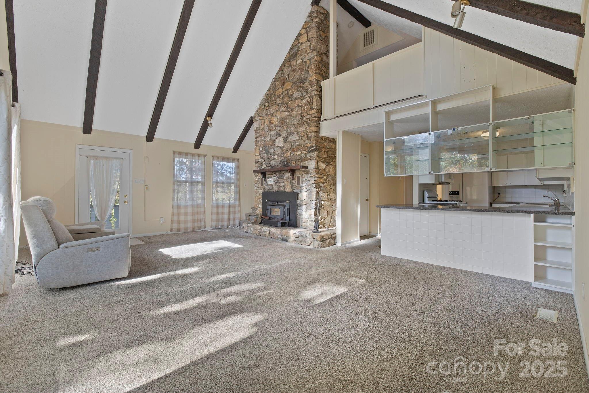 95 Temple Road Black Mountain, NC 28711 - Photo 7 of 30 a living room with furniture and a fireplace