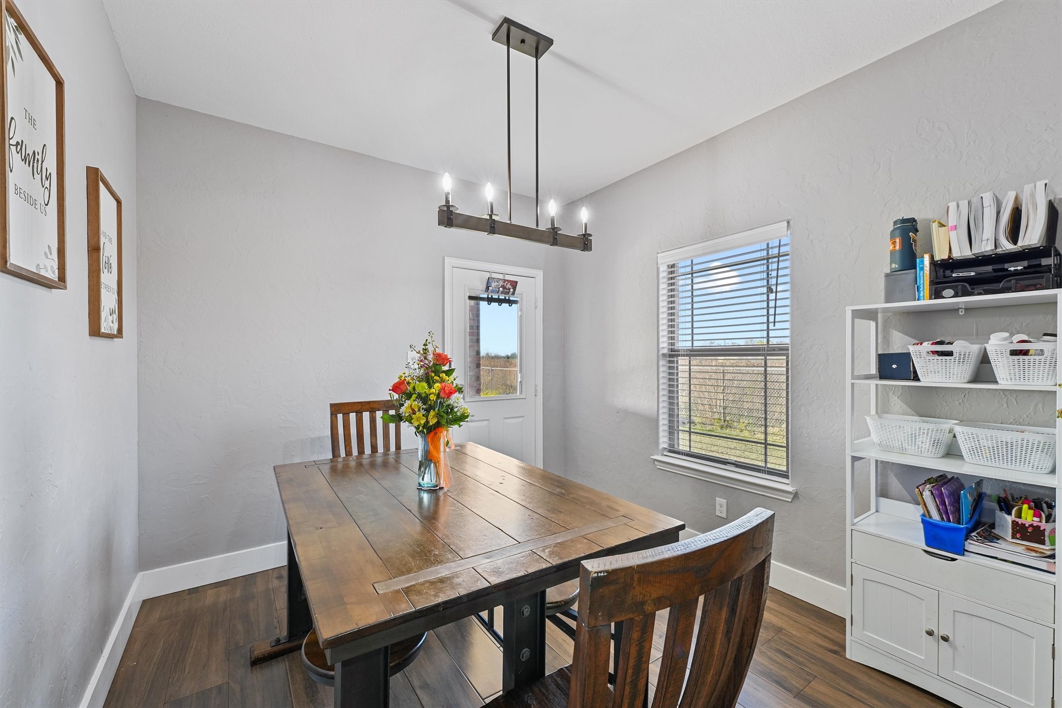 19545 Crosby Eastgate Road Crosby, TX 77532 - Photo 13 of 27 a view of a dining room with furniture window and wooden floor