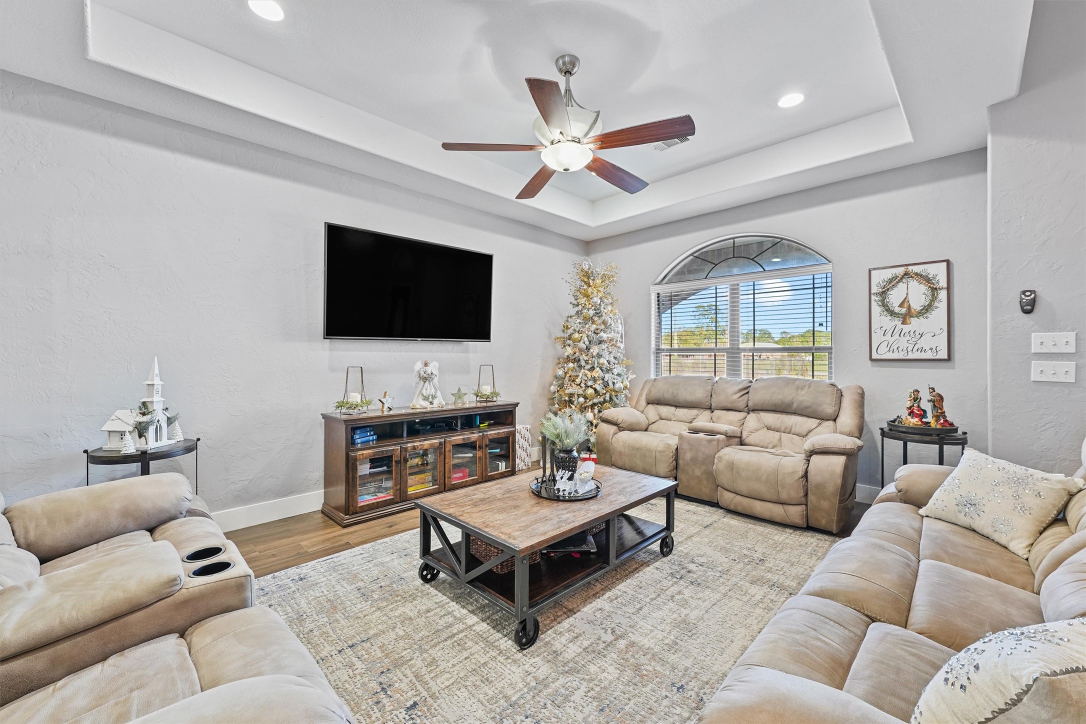 19545 Crosby Eastgate Road Crosby, TX 77532 - Photo 9 of 27 a living room with furniture and a flat screen tv