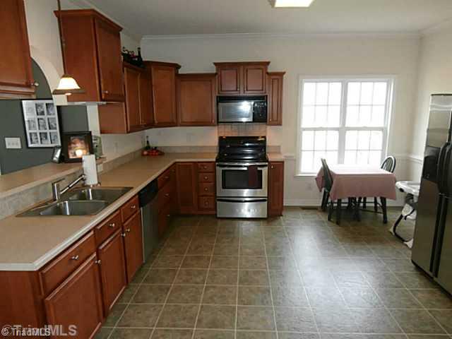 2840 Collinstown Road Westfield, NC 27053 - Photo 2 of 16 Kitchen. ENORMOUS Kitchen. I mean this kitchen is twice as big as most kitchens.