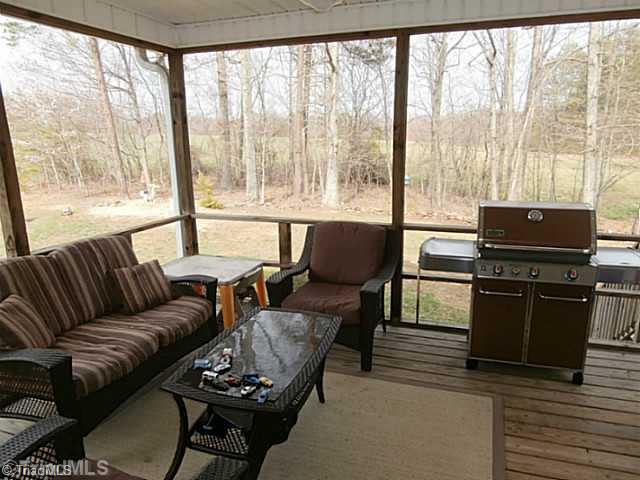 2840 Collinstown Road Westfield, NC 27053 - Photo 15 of 16 Screened Porch. The view from the screened porch is great.
