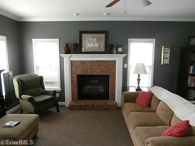 2840 Collinstown Road Westfield, NC 27053 - Photo 4 of 16 Den/Family/Great Room. Cozy den with fireplace, and french doors to the screened porch.