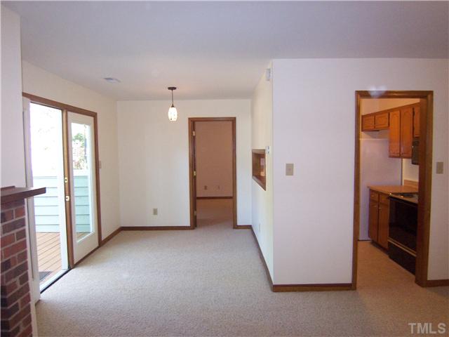 3201 Mill Run Raleigh, NC 27612 - Photo 5 of 12 The crisp white newly painted walls show very well and invite you to make this your home. A serving hatch between the kitchen and dining area makes entertaining a pleasure.
