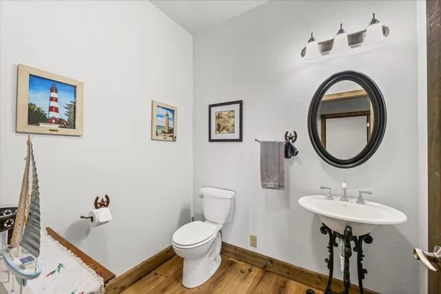 a view of a house with a yard balcony and sitting area