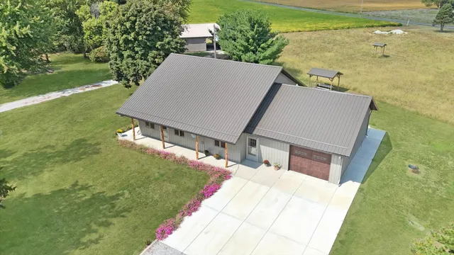 a terrace with a yard and ocean view