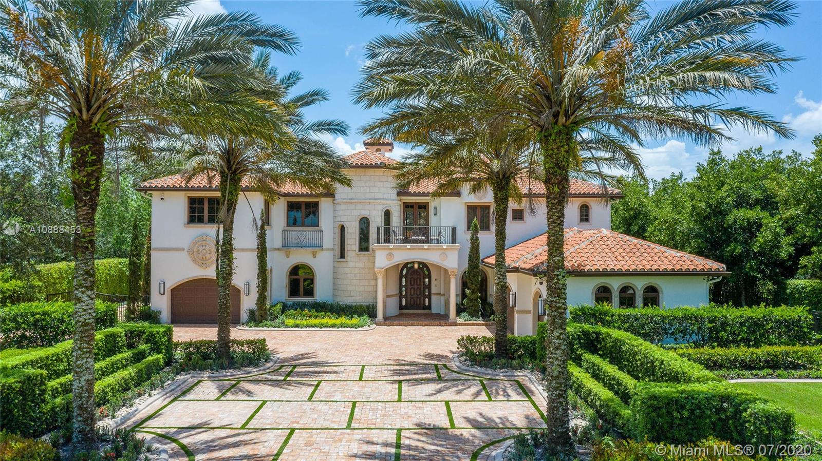 a front view of a house with garden and porch