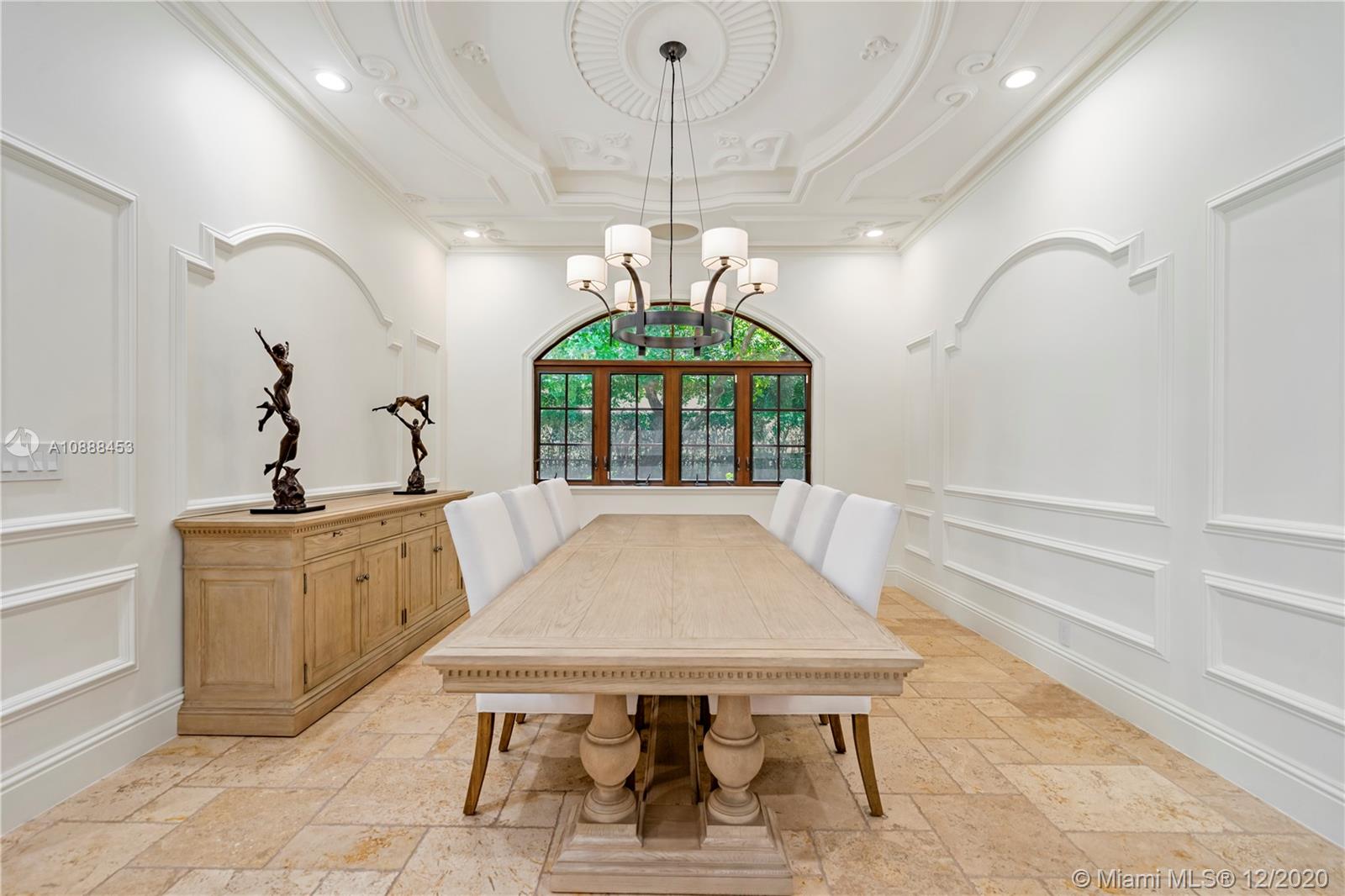12704 Stonebrook Drive Davie, FL 33330 - Photo 14 of 57 a view of a hallway with furniture and chandelier