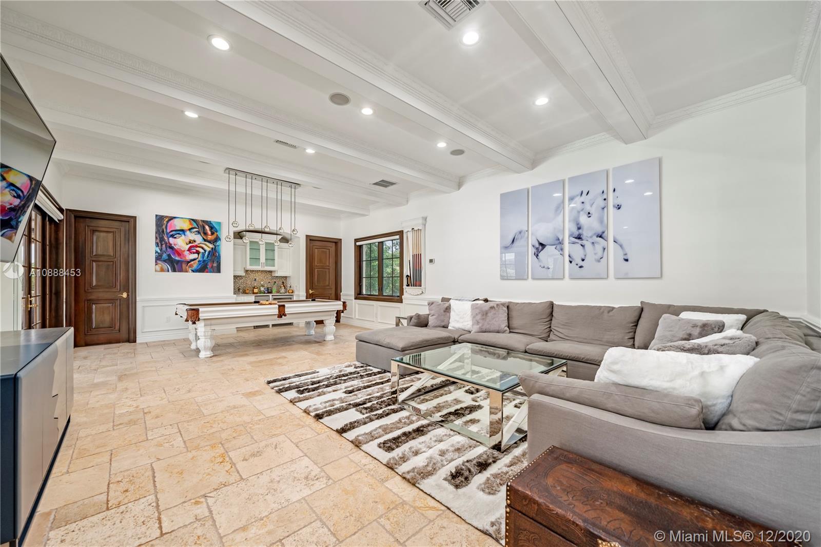 12704 Stonebrook Drive Davie, FL 33330 - Photo 16 of 57 a living room with furniture and a rug