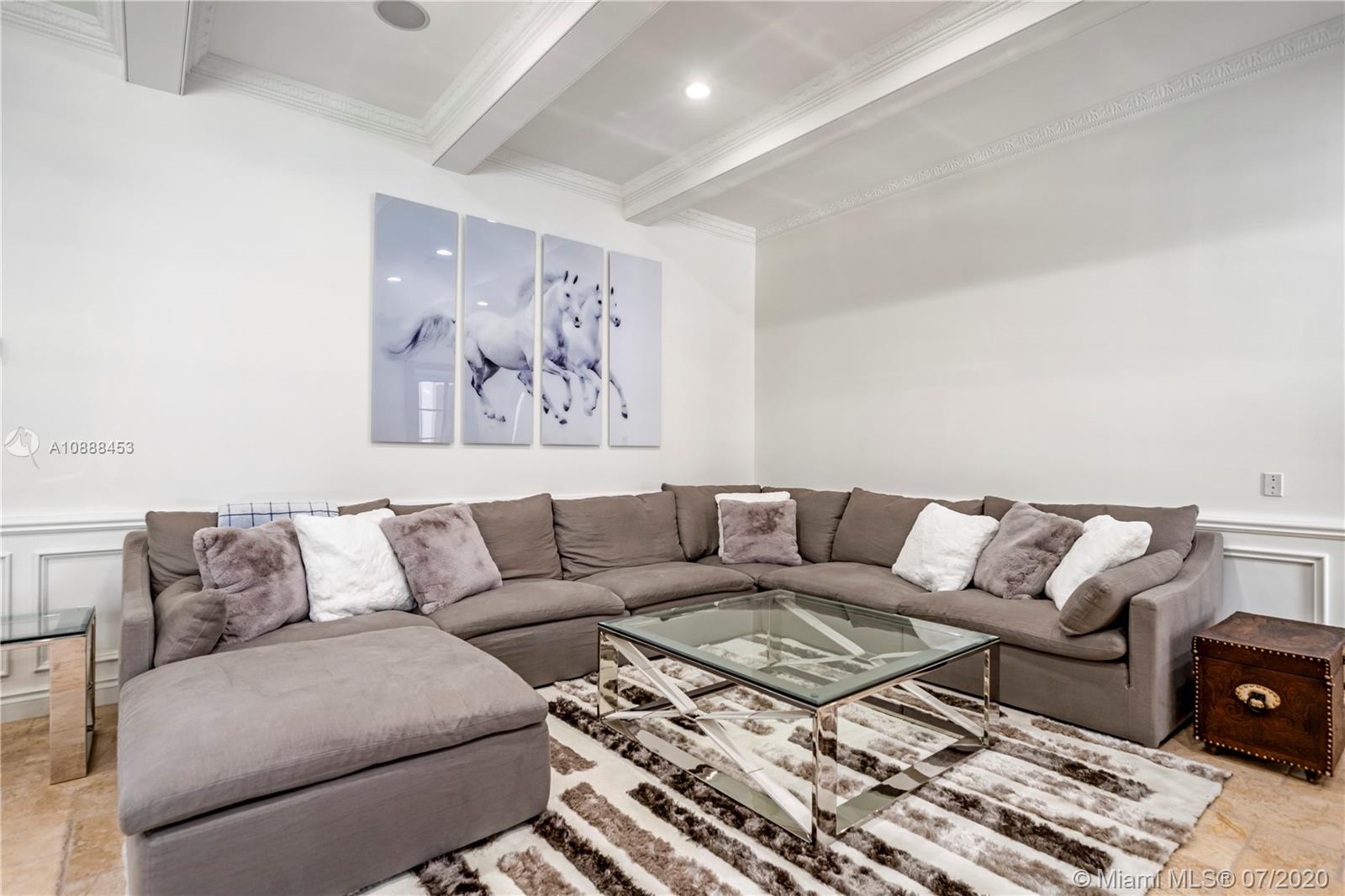 12704 Stonebrook Drive Davie, FL 33330 - Photo 17 of 57 a living room with furniture and a couch