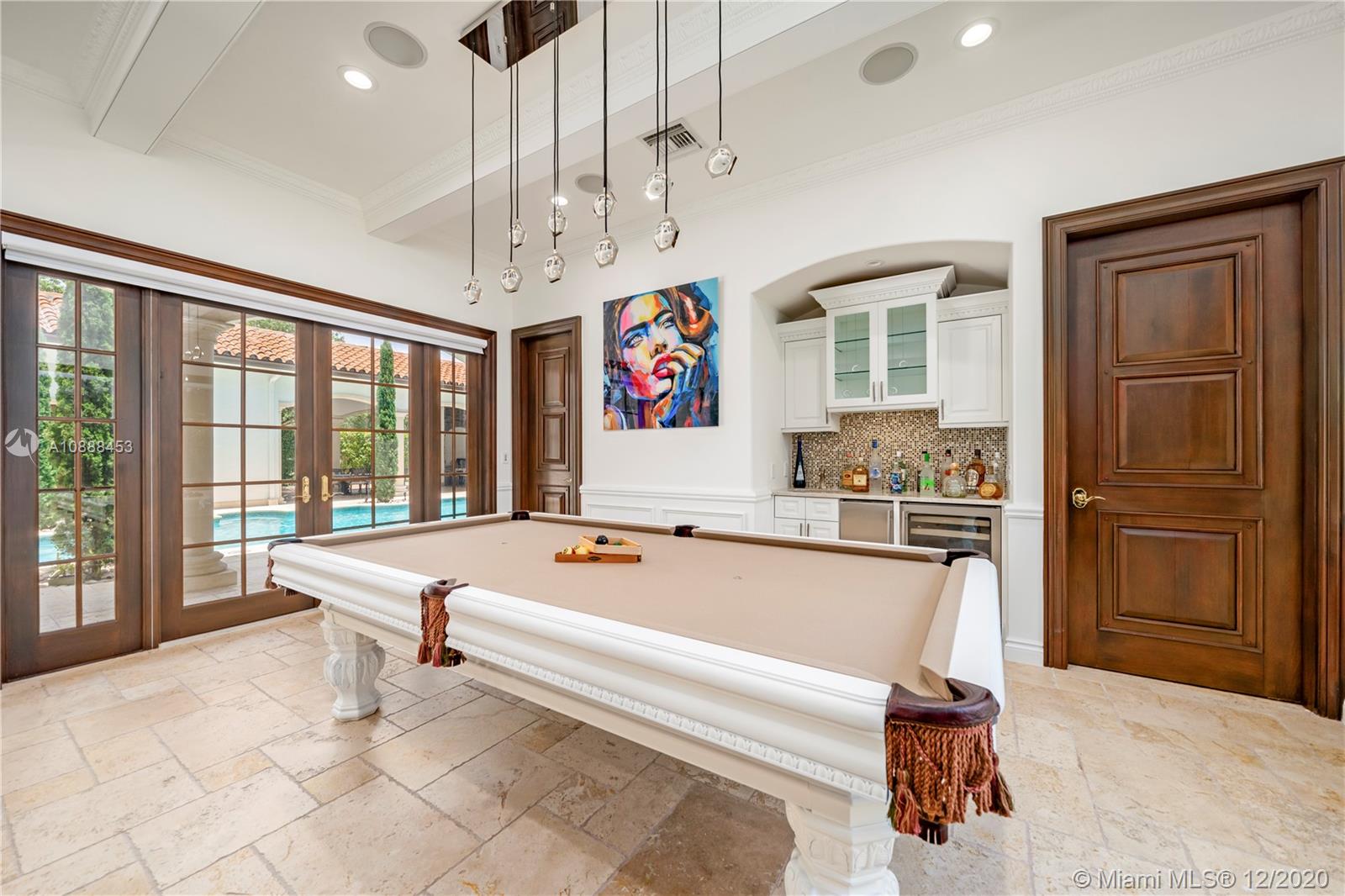 12704 Stonebrook Drive Davie, FL 33330 - Photo 18 of 57 a living room with granite countertop furniture and flat screen tv