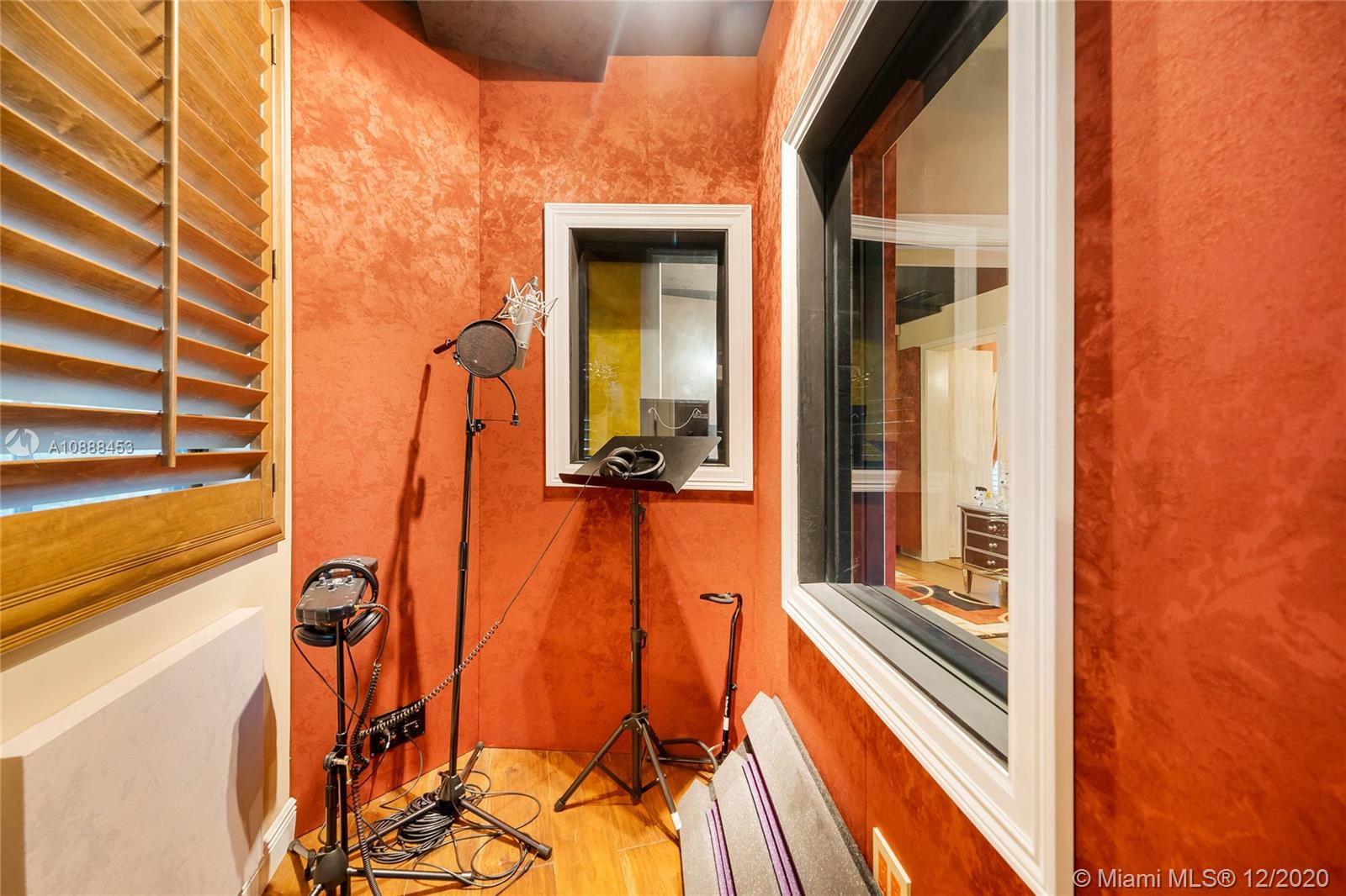 12704 Stonebrook Drive Davie, FL 33330 - Photo 22 of 57 a view of balcony with a floor to ceiling window and wooden floor