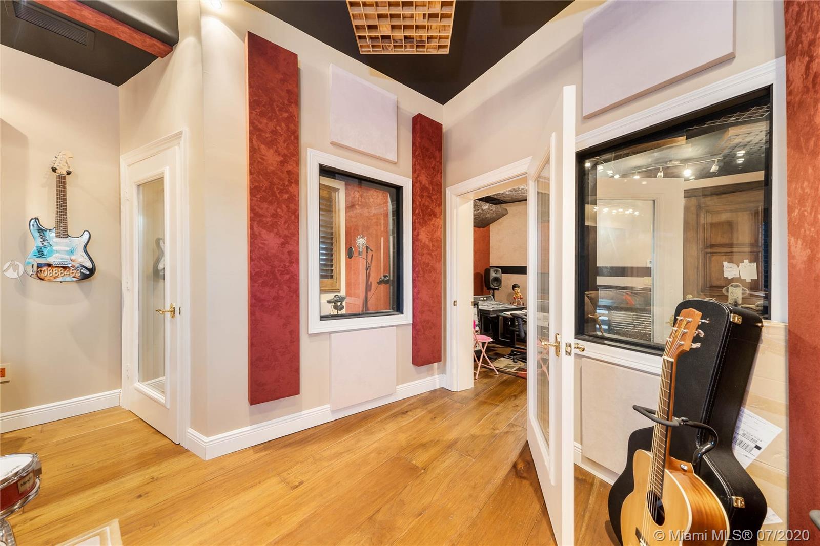 12704 Stonebrook Drive Davie, FL 33330 - Photo 23 of 57 a view of a room with gym equipment