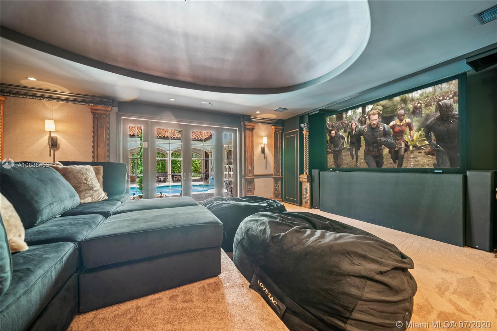 12704 Stonebrook Drive Davie, FL 33330 - Photo 25 of 57 a bed sitting in a spacious bedroom next to a window