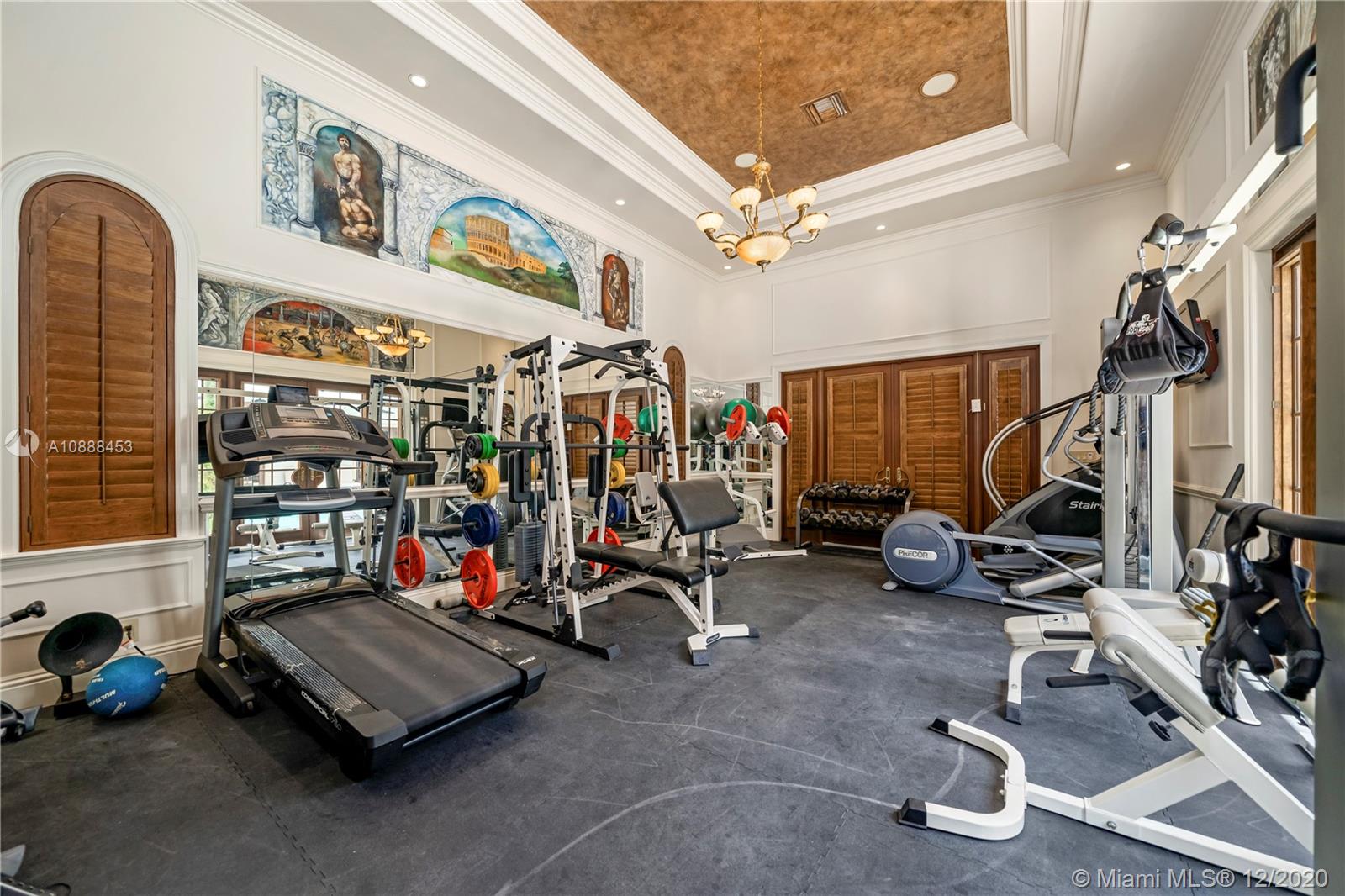12704 Stonebrook Drive Davie, FL 33330 - Photo 34 of 57 a view of a room with gym equipment
