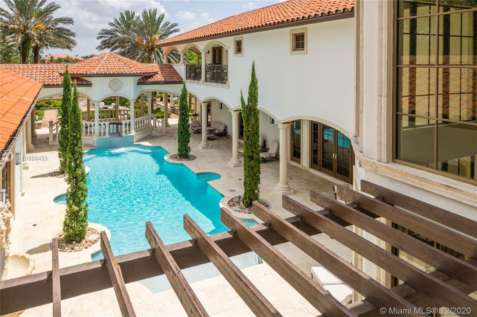 12704 Stonebrook Drive Davie, FL 33330 - Photo 37 of 57 a front view of a house with garden