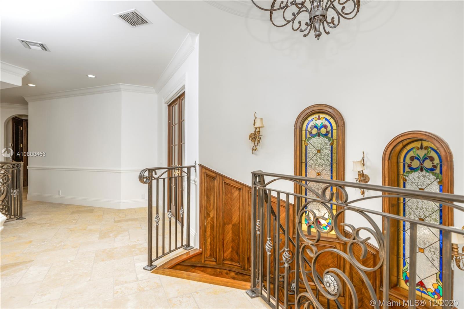 12704 Stonebrook Drive Davie, FL 33330 - Photo 40 of 57 a view of front door with wooden floor