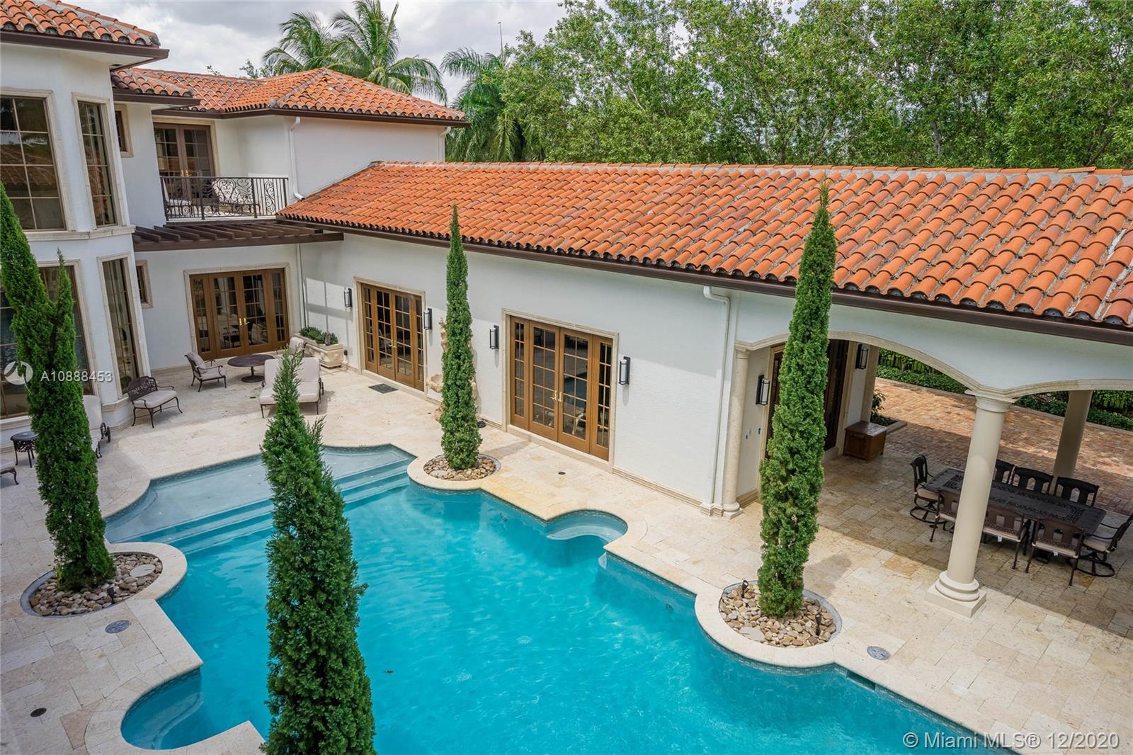 12704 Stonebrook Drive Davie, FL 33330 - Photo 49 of 57 a house with garden in front of it