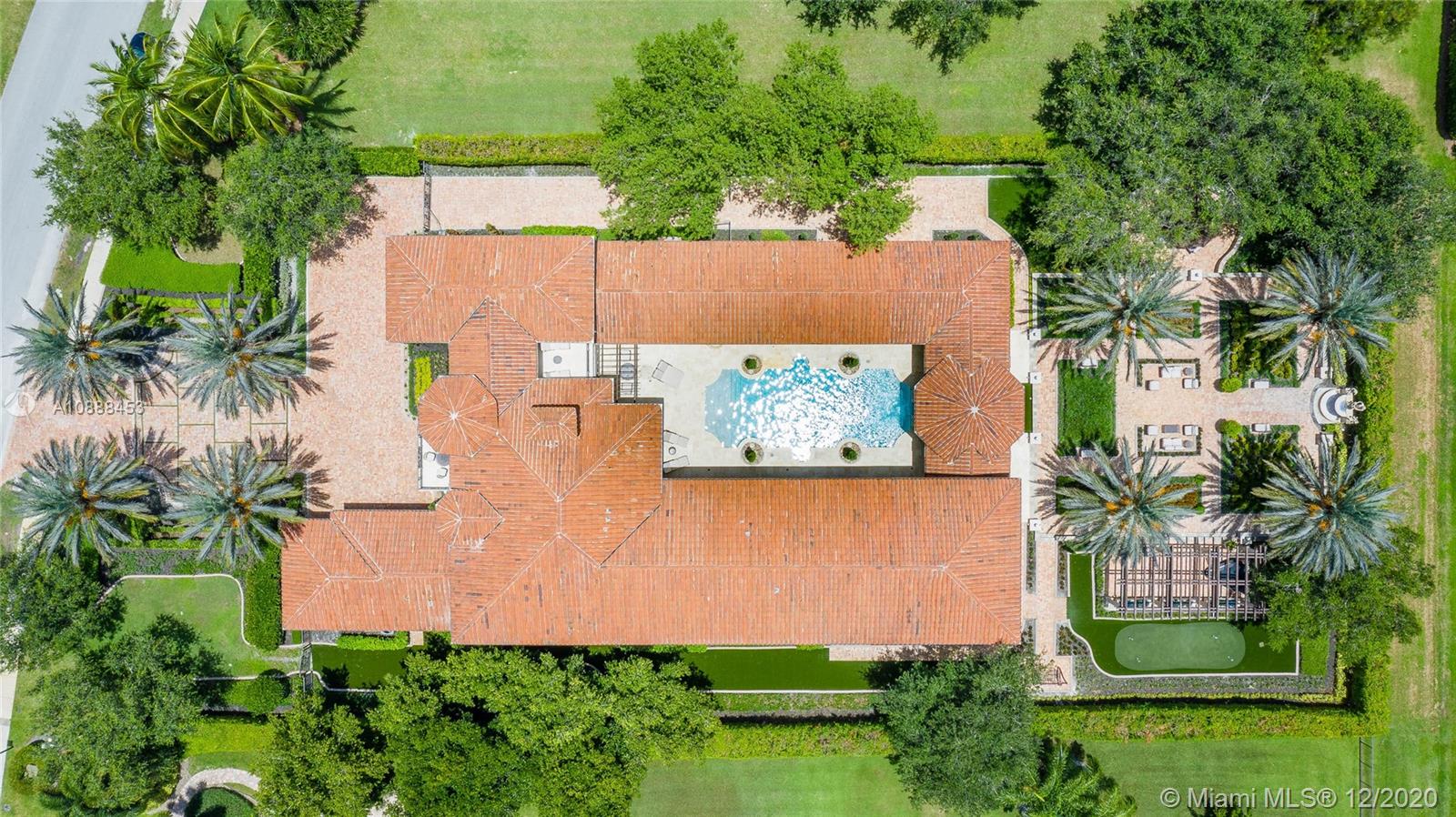 12704 Stonebrook Drive Davie, FL 33330 - Photo 52 of 57 an aerial view of a house with a yard and lake view