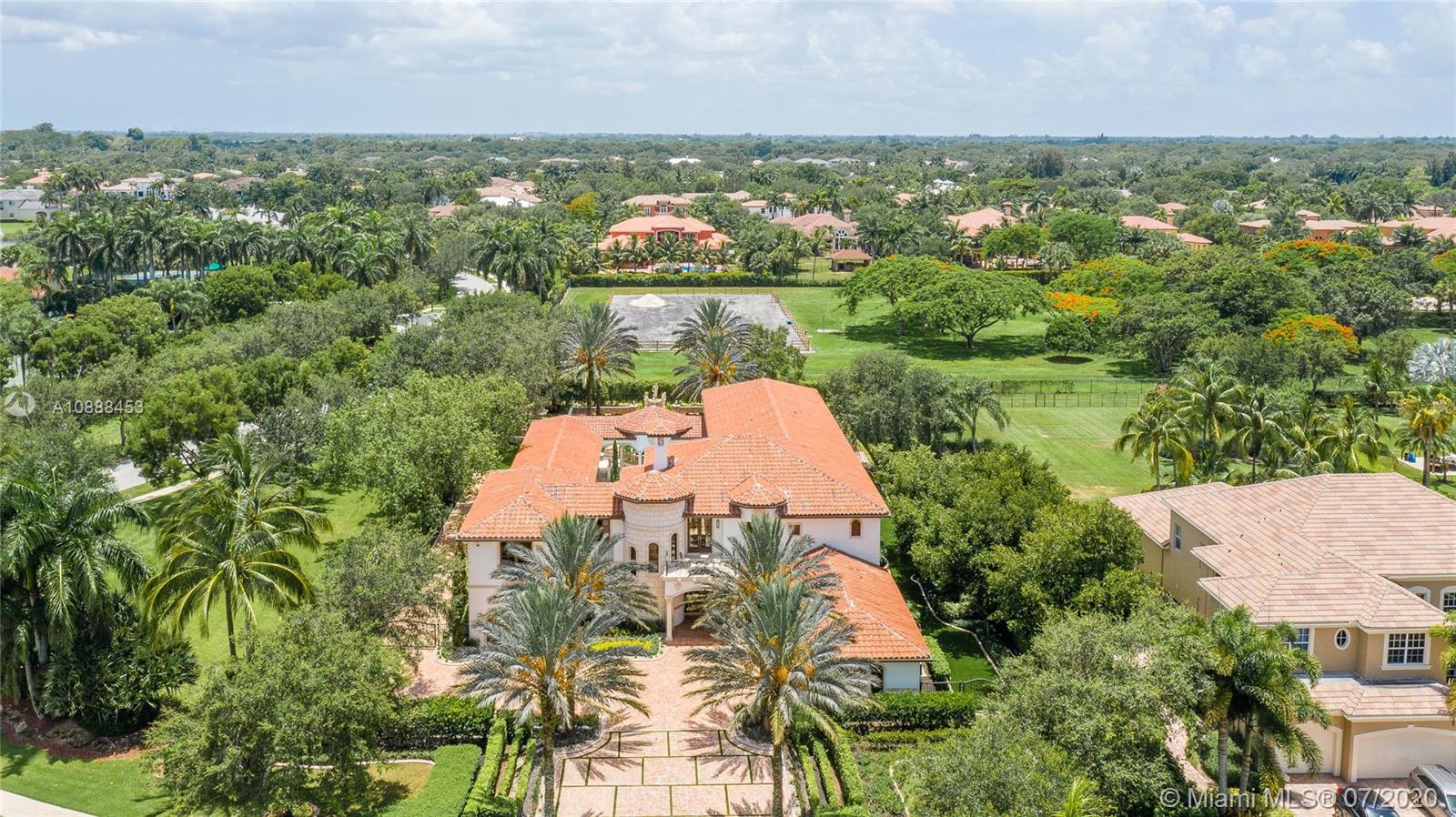 12704 Stonebrook Drive Davie, FL 33330 - Photo 57 of 57 an aerial view of a house with a lake view