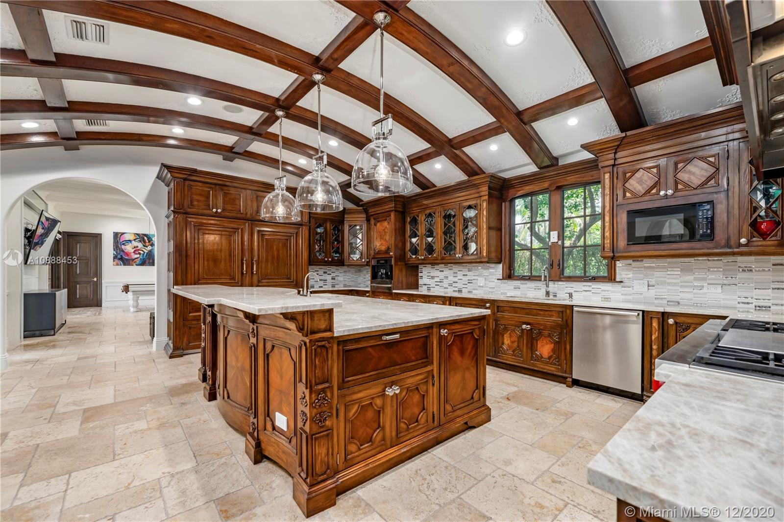 12704 Stonebrook Drive Davie, FL 33330 - Photo 8 of 57 a view of a kitchen with stainless steel appliances granite countertop a stove and a cabinets