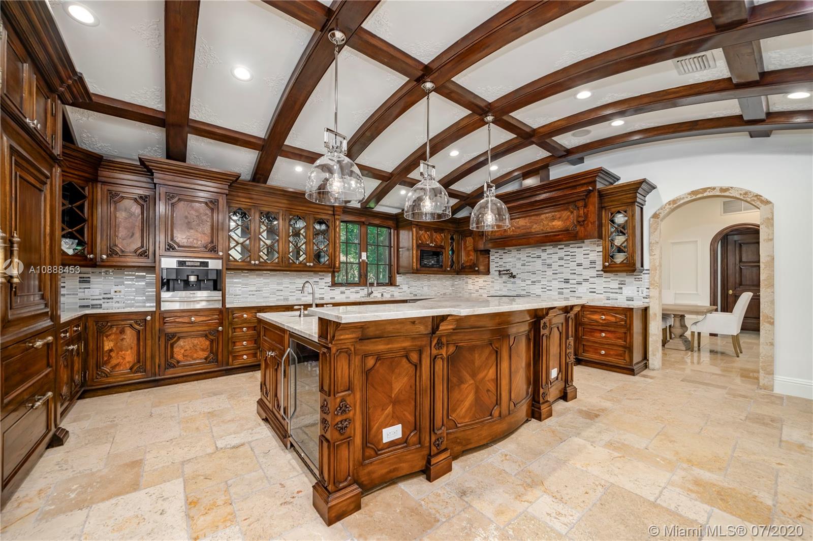 12704 Stonebrook Drive Davie, FL 33330 - Photo 10 of 57 a open kitchen with stainless steel appliances granite countertop a sink and cabinets